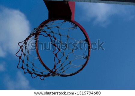 Outdoor basketball On the background of the blue sky