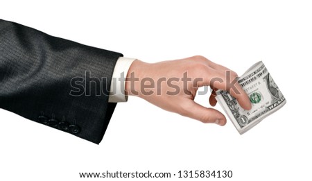 Male hand holding bundle of dollars isolated on white background. Business and finance. Management and investment. Income and commerce.