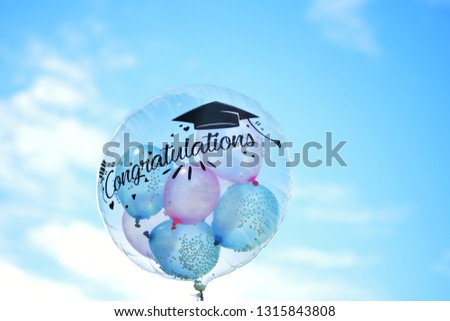 Balloons with confetti and text Congrats.