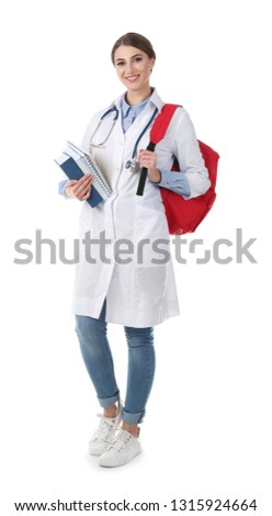 Young medical student with books and backpack on white background