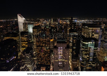 New York City skyline warm panorama at night
