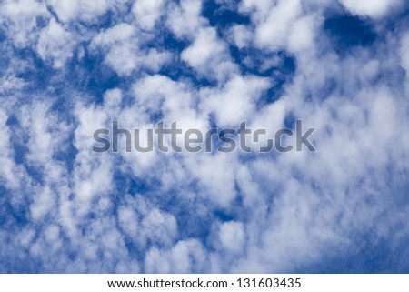 Abstract sky background with contrast cumulus clouds
