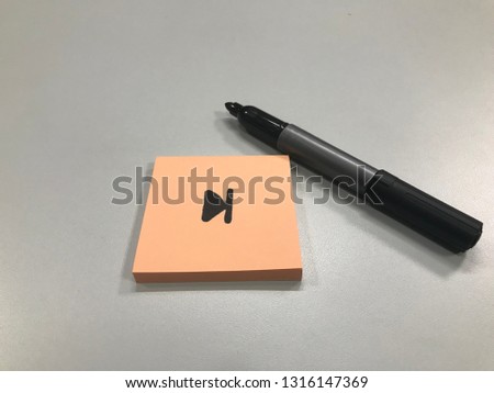 Black marker and symbols on paper