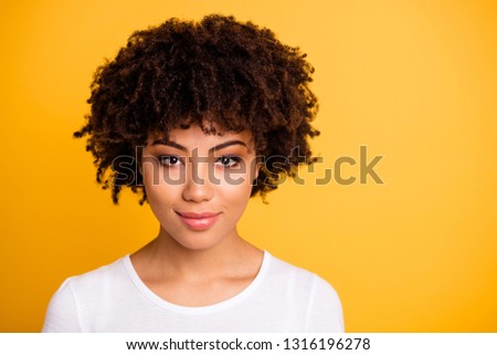 Close up photo beautiful amazing she her dark skin lady lovely look self-confident optimistic nice cool pretty wear casual white t-shirt isolated yellow bright vibrant vivid background