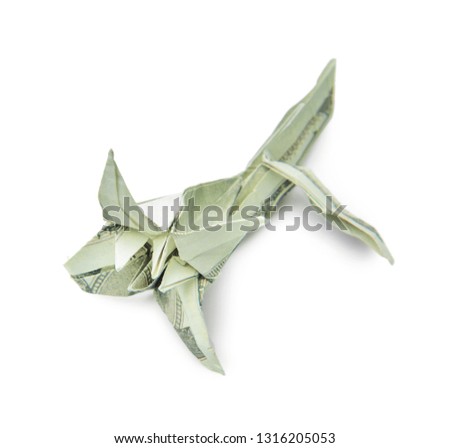 Origami flower made of dollar banknote on white background