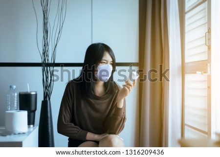 Asian woman reading medicine label and prescription medications,Health care and people concept