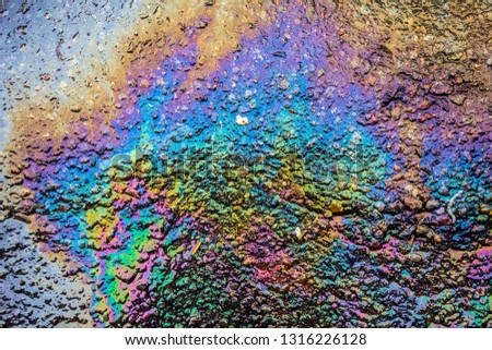 Gasoline Petrol Rainbow Oil Spill on Tarmac Road