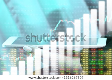 Businessman on digital stock market financial positive indicator background. Double exposure of growth graph futuristic economic currency chart investor data analysis money exchange technology concept