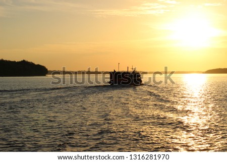 the sunsets over the selat karimata river, the southern part of the island of Borneo