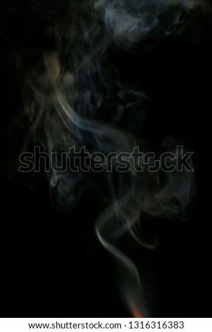 Flame and smoke on a black background