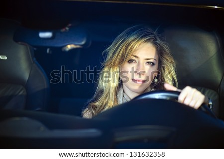 Picture of yang and beautiful driving woman.