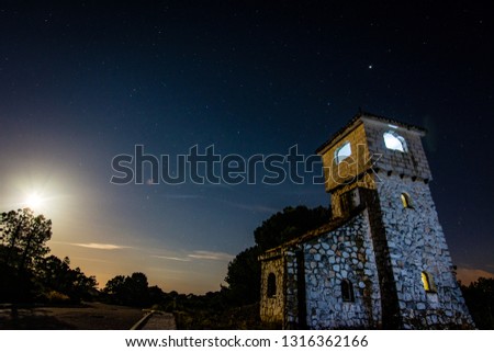 old tower under the moonlight