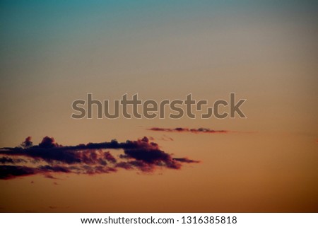 Colorful Sky with Line of Clouds in the Summer Time