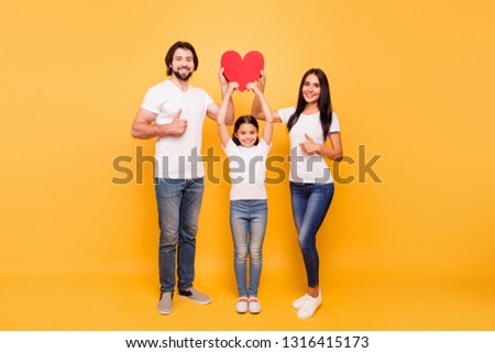 Full length body size view portrait of nice lovely charming attractive cheerful people holding in hands big large card showing thumbsup isolated over shine vivid pastel yellow background