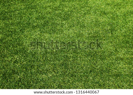Artificial turf background material