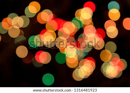 Multi color bokeh, Defocused light for Christmas, New year and funny holiday background.