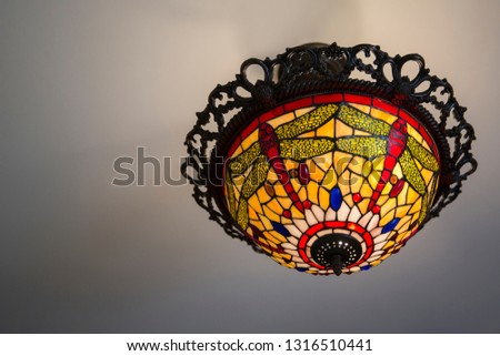 Vintage multi colored ceiling mosaic lamp.