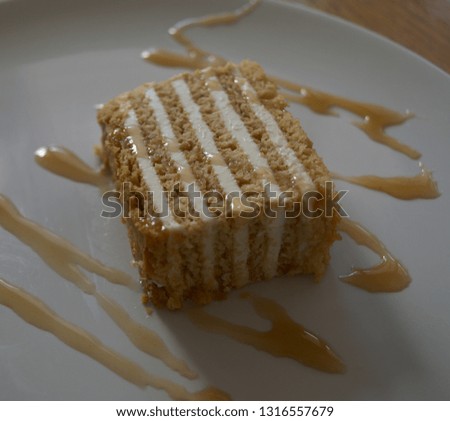 Homemade cake with honey and cream