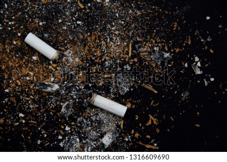 cigarette garbage on a black background