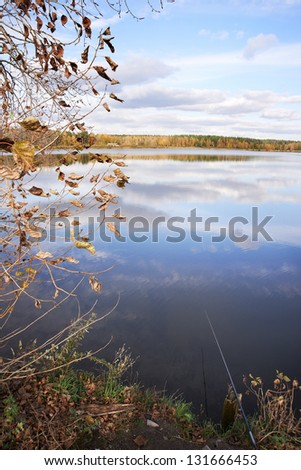 Landscape with lake, woods and sky
