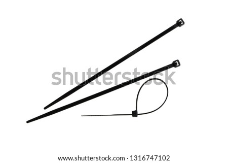 close-up of cable ties and a locked cable tie, isolated on white background