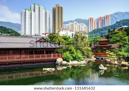 Pond and cityscape viewed from Nan Lian Garden in Hong Kong, China.
