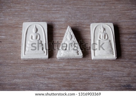 small Buddha image used as amulet