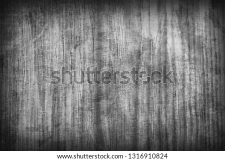 Colorless grunge wooden texture background, vertical grain pattern, vignetting effect