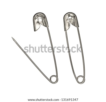 Safety pin isolated on white background Royalty-Free Stock Photo #131691347