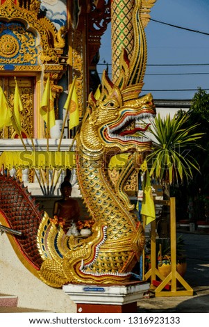 golden dragon on the roof of thai temple, digital photo picture as a background