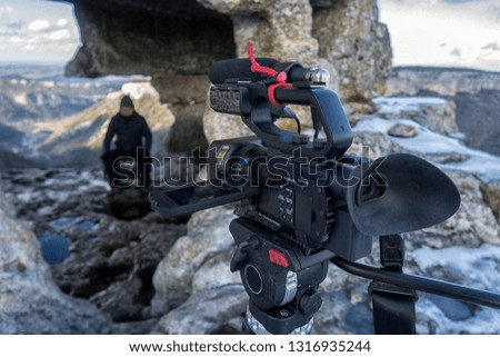 professional video camera on the shooting of natural landscapes.
