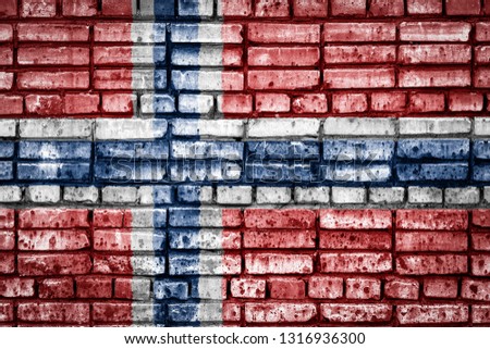 National flag of  Norway on a brick background. Concept image for Norway: language , people and culture.