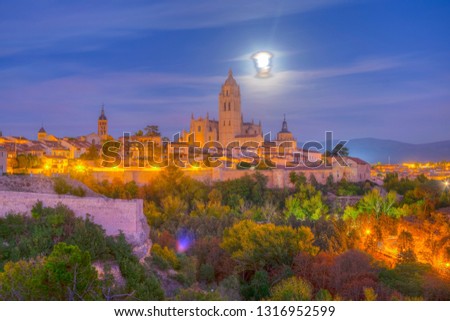Sunset view of cityscape of Segovia with the gothic cathedral, Spain
