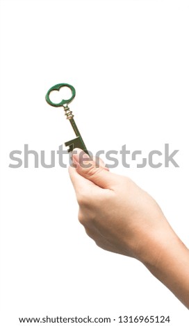 The hand of the person holding the key. It isolated on white background. Use for edit your work. business concept