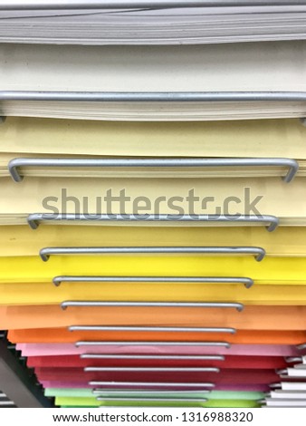 The color paper which is laid out in a row in art shop