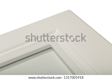 Detail close-up of a white frame facade for the kitchen.
