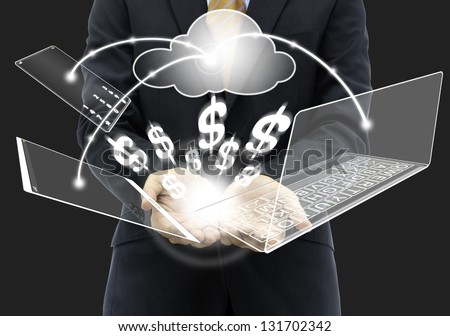 Businessman holding money with cloud computing solution Royalty-Free Stock Photo #131702342