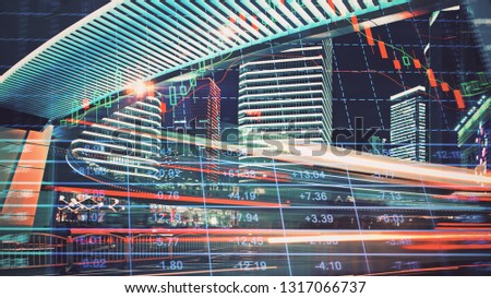 Trading graph on the cityscape at night background. Business and financial concept. Double exposure. Shanghai