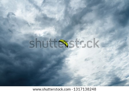 Kite on the background of clouds.