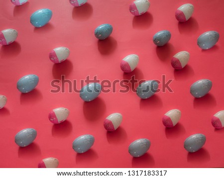 Easter eggs pattern on red background