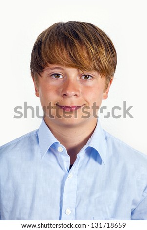 portrait of  cute young happy boy with white background