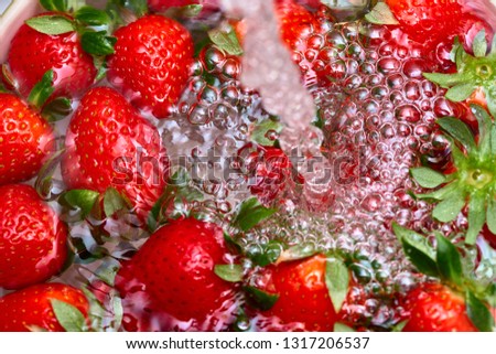 strawberries in the water, washing strawberries