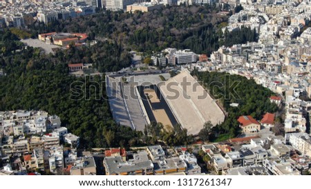 Aerial drone photo of iconic ancient Panathenaic stadium or Kalimarmaro as seen from distance, Athens historic centre, Attica, Greece