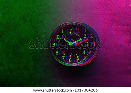 The clock glitch effect duotone in bright neon, modern colors. Retro wave. Plastic pink, ufo green, proton purple 2019. Horizontal, copy space,