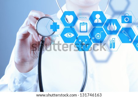 Medicine doctor hand working with modern computer interface as concept Royalty-Free Stock Photo #131746163