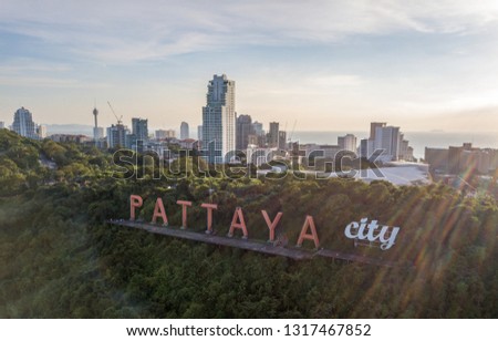 Aerial View of the Pattaya City Sign with the Pattaya Skyline at Dusk