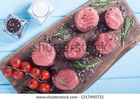 Raw filet mignon . Beef sreak on rustic background