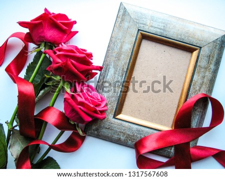 romantic composition. a bouquet of flowers and a frame for photos. congratulation. invitation. postcard design