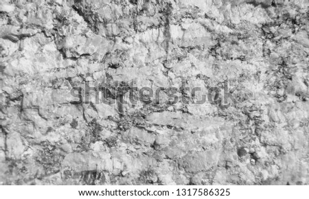 granite section background. Black and white photo