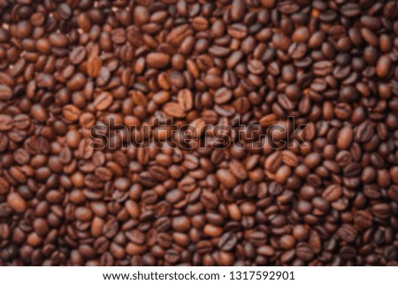 coffee beans in unfocused background